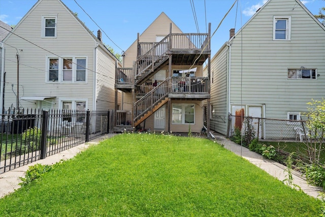3034 S Komensky Ave, Chicago, IL 60623 - rear view of house featuring stairway and a wooden deck