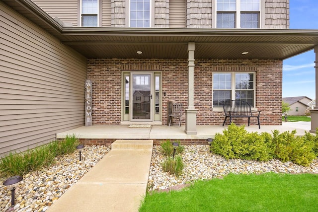 2708 Red Rock Rd, Normal, IL 61761 - property entrance featuring brick siding and a porch