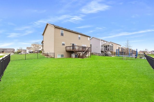 2708 Red Rock Rd, Normal, IL 61761 - back of house with stairs, a trampoline, a wooden deck, and a residential view
