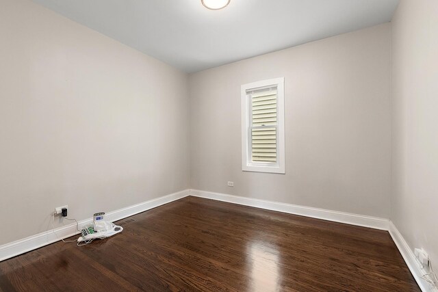 12424 S Carpenter St, Calumet Park, IL 60827 - unfurnished room featuring baseboards and dark wood-style floors