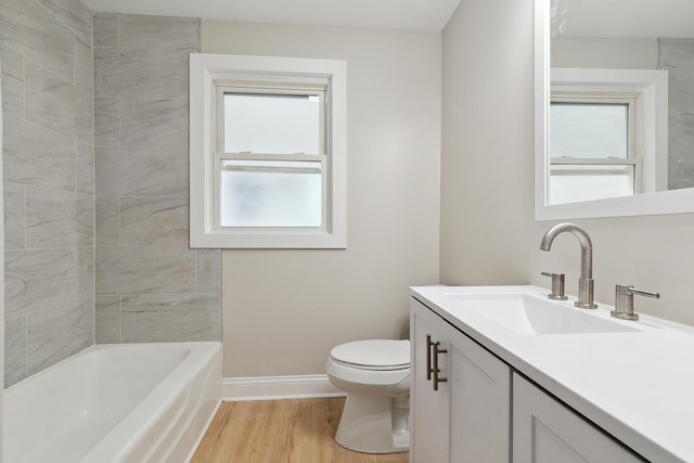 12424 S Carpenter St, Calumet Park, IL 60827 - bathroom featuring vanity, toilet, wood finished floors, and baseboards