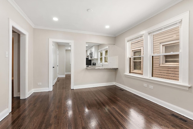 12424 S Carpenter St, Calumet Park, IL 60827 - unfurnished living room featuring dark wood-type flooring, baseboards, crown molding, and recessed lighting