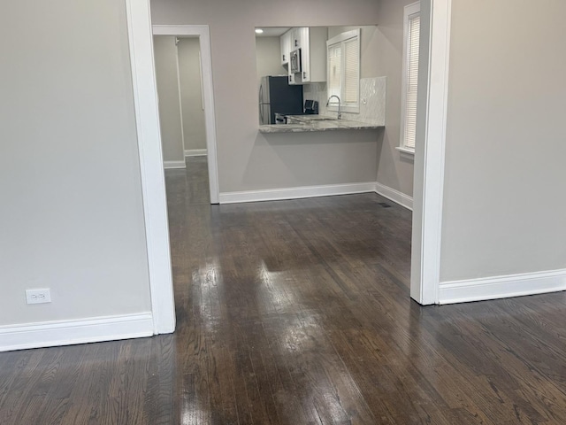 12424 S Carpenter St, Calumet Park, IL 60827 - kitchen featuring stainless steel appliances, baseboards, dark wood-type flooring, white cabinets, and a sink