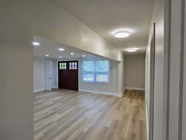 2524 Gray Ct, Waukegan, IL 60085 - foyer entrance with light wood finished floors, baseboards, and recessed lighting