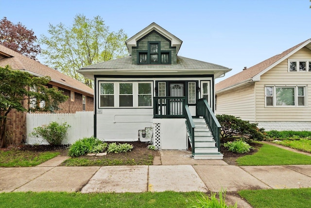 11522 S Parnell Ave, Chicago, IL 60628 - bungalow-style house with roof with shingles