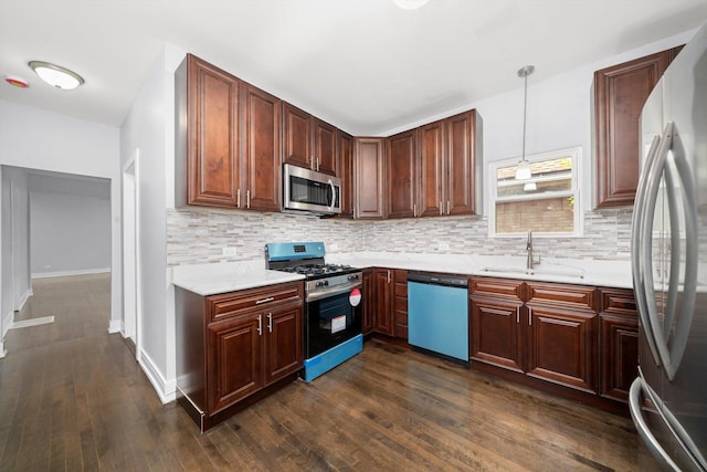 11522 S Parnell Ave, Chicago, IL 60628 - kitchen with stainless steel appliances, a sink, decorative backsplash, and dark wood finished floors