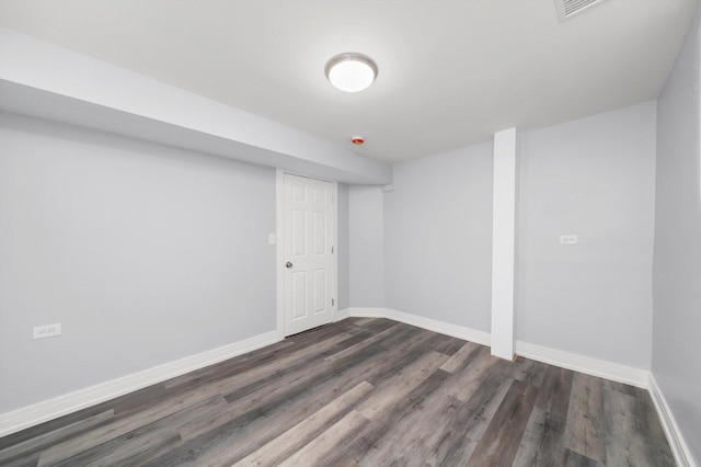11522 S Parnell Ave, Chicago, IL 60628 - finished basement featuring dark wood finished floors and baseboards