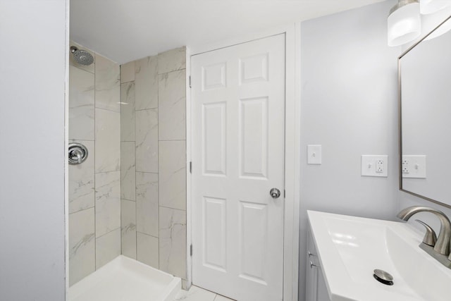 11522 S Parnell Ave, Chicago, IL 60628 - bathroom featuring a tile shower and vanity