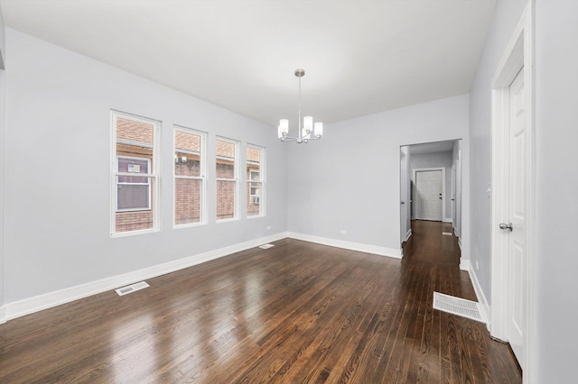 11522 S Parnell Ave, Chicago, IL 60628 - unfurnished dining area featuring a chandelier, dark wood-style floors, and baseboards