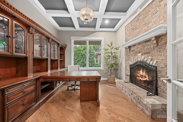 4103 Douglas Rd, Downers Grove, IL 60515 - office space with wood finished floors, a brick fireplace, coffered ceiling, beamed ceiling, and a chandelier