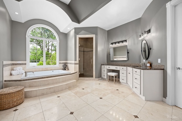 4103 Douglas Rd, Downers Grove, IL 60515 - full bathroom featuring vanity, a garden tub, a shower stall, and tile patterned flooring