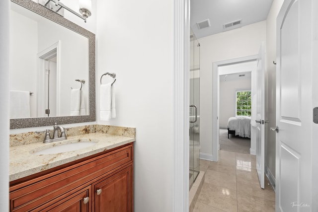4103 Douglas Rd, Downers Grove, IL 60515 - ensuite bathroom featuring a stall shower, vanity, and tile patterned flooring