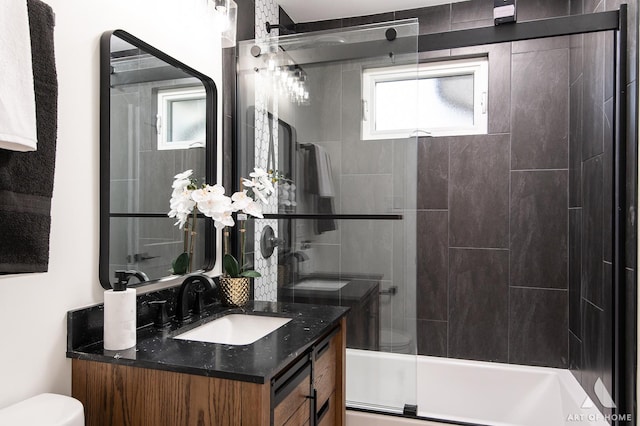 9859 S 81st Ave, Palos Hills, IL 60465 - full bathroom featuring toilet, vanity, bathtub / shower combination, and healthy amount of natural light