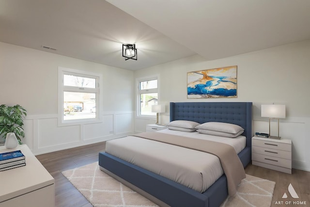 9859 S 81st Ave, Palos Hills, IL 60465 - bedroom featuring a wainscoted wall, wood finished floors, and a decorative wall