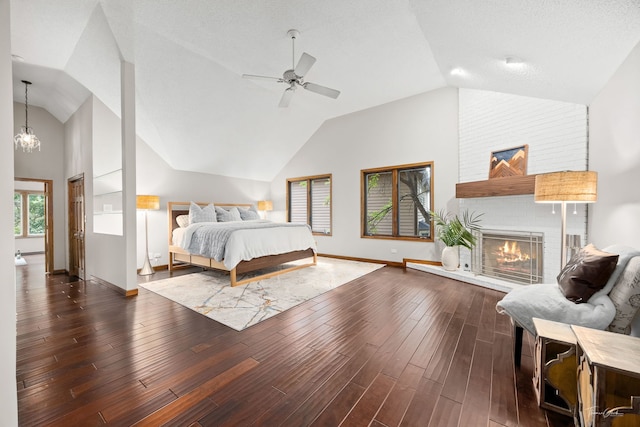 2734 Alyssa Dr, Naperville, IL 60565 - bedroom featuring vaulted ceiling, a fireplace, dark wood finished floors, and ceiling fan