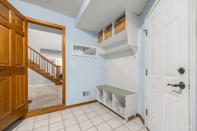 2734 Alyssa Dr, Naperville, IL 60565 - mudroom with baseboards and light tile patterned floors