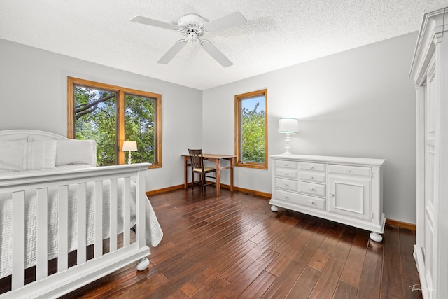 2734 Alyssa Dr, Naperville, IL 60565 - bedroom featuring dark wood-style floors, a ceiling fan, and a textured ceiling
