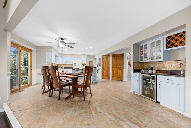 2734 Alyssa Dr, Naperville, IL 60565 - dining space featuring wine cooler, wet bar, recessed lighting, and ceiling fan
