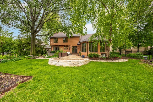 2734 Alyssa Dr, Naperville, IL 60565 - rear view of property featuring a patio area, a sunroom, and roof with shingles