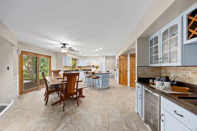 2734 Alyssa Dr, Naperville, IL 60565 - dining space featuring beverage cooler, recessed lighting, and ceiling fan