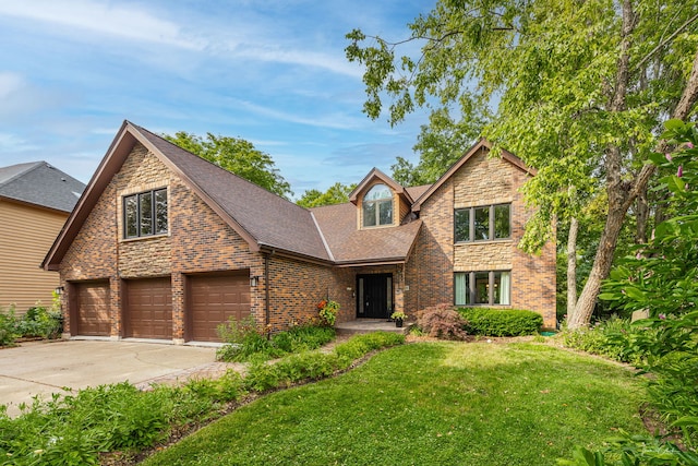 2734 Alyssa Dr, Naperville, IL 60565 - traditional-style home featuring driveway, a front yard, a shingled roof, and brick siding