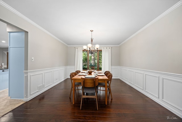 2734 Alyssa Dr, Naperville, IL 60565 - dining room featuring a chandelier, ornamental molding, wainscoting, dark wood-style flooring, and a decorative wall