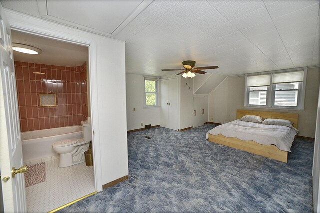 731 Marcy St, Ottawa, IL 61350 - bedroom featuring baseboards, ensuite bath, ceiling fan, and carpet