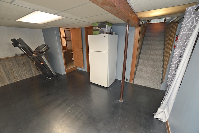 731 Marcy St, Ottawa, IL 61350 - finished below grade area featuring freestanding refrigerator, stairway, and wood finished floors
