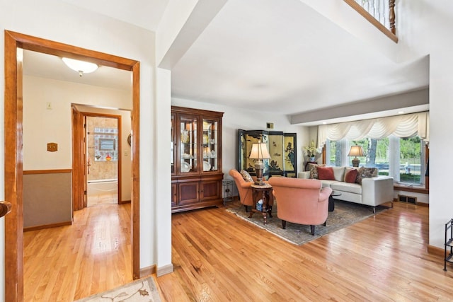 8252 N Caldwell Ave, Niles, IL 60714 - living room featuring light wood finished floors