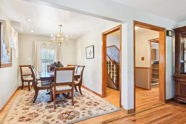 8252 N Caldwell Ave, Niles, IL 60714 - dining room with light wood-style flooring, a chandelier, baseboards, and recessed lighting