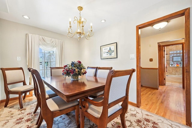 8252 N Caldwell Ave, Niles, IL 60714 - dining space featuring light wood-style flooring, a chandelier, baseboards, and recessed lighting
