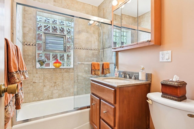 8252 N Caldwell Ave, Niles, IL 60714 - full bath with vanity, toilet, and combined bath / shower with glass door