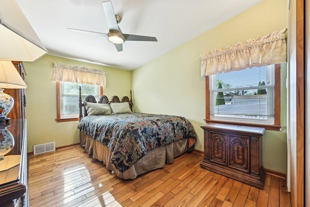8252 N Caldwell Ave, Niles, IL 60714 - bedroom featuring hardwood / wood-style flooring, baseboards, and ceiling fan
