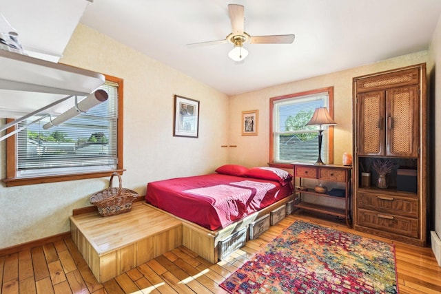 8252 N Caldwell Ave, Niles, IL 60714 - bedroom with hardwood / wood-style floors and a ceiling fan
