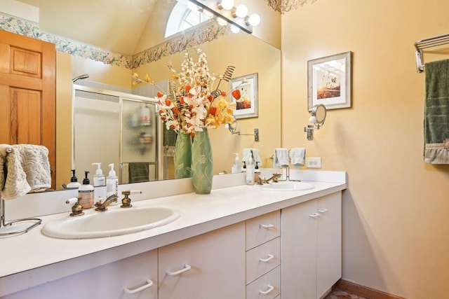 8252 N Caldwell Ave, Niles, IL 60714 - bathroom featuring double vanity, a stall shower, and lofted ceiling