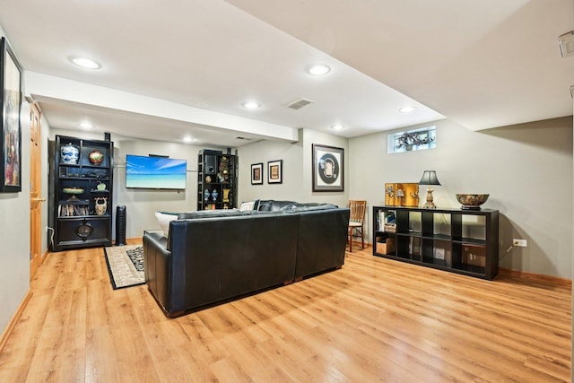 8252 N Caldwell Ave, Niles, IL 60714 - living room with light wood-style flooring, recessed lighting, and baseboards