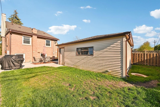 8252 N Caldwell Ave, Niles, IL 60714 - rear view of house featuring a patio area and an outdoor structure