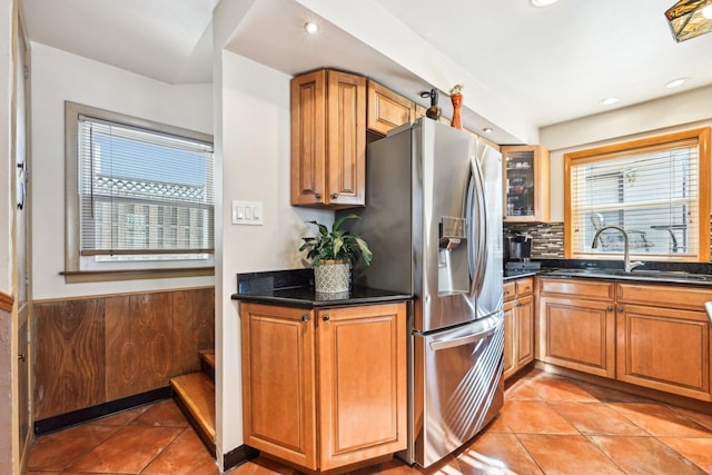 8252 N Caldwell Ave, Niles, IL 60714 - kitchen with stainless steel fridge with ice dispenser, a sink, healthy amount of natural light, light tile patterned flooring, and recessed lighting