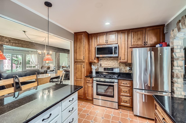 1360 Gentry Rd, Hoffman Estates, IL 60169 - kitchen featuring appliances with stainless steel finishes, decorative backsplash, dark stone countertops, open floor plan, and brown cabinets