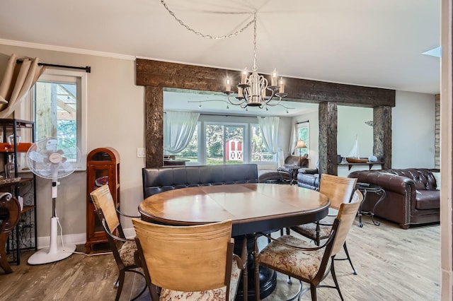 1360 Gentry Rd, Hoffman Estates, IL 60169 - dining room with wood finished floors, a chandelier, ornamental molding, and baseboards