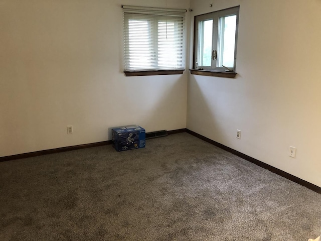 6100 S Parkside Ave, Chicago, IL 60638 - empty room featuring carpet floors and baseboards