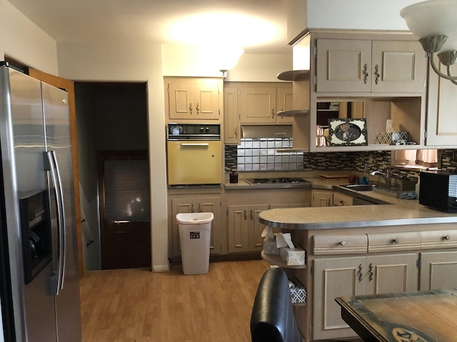 6100 S Parkside Ave, Chicago, IL 60638 - kitchen featuring wall oven, stainless steel refrigerator with ice dispenser, open shelves, and decorative backsplash