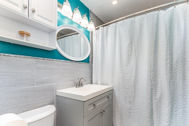 19011 John Ave, Country Club Hills, IL 60478 - bathroom with toilet, vanity, tile walls, and recessed lighting