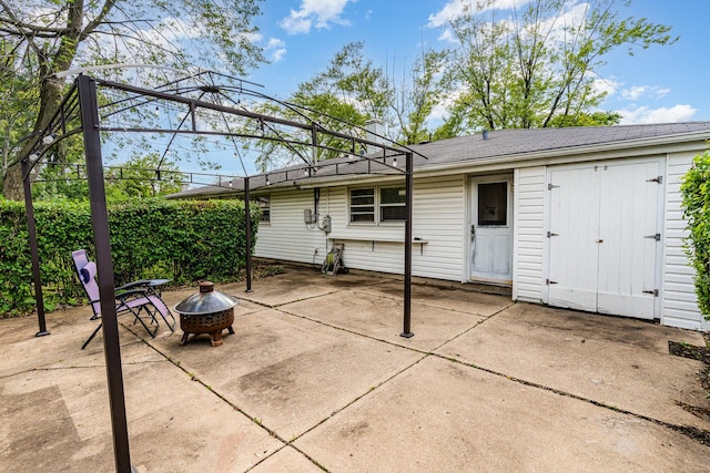 19011 John Ave, Country Club Hills, IL 60478 - back of property with a fire pit and a patio