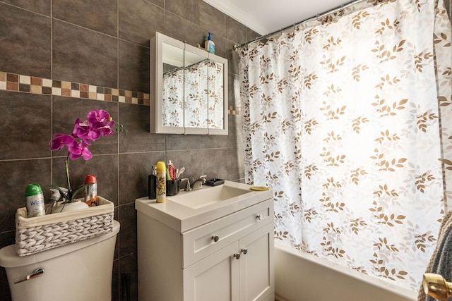 4109 W Oakdale Ave, Chicago, IL 60641 - full bathroom featuring tile walls, toilet, vanity, shower / bathtub combination with curtain, and crown molding