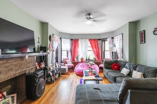 4109 W Oakdale Ave, Chicago, IL 60641 - living area with a ceiling fan, wood finished floors, and a fireplace