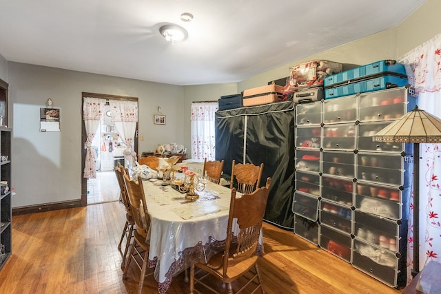 4109 W Oakdale Ave, Chicago, IL 60641 - dining room featuring wood finished floors and baseboards