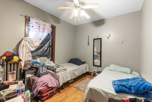 4109 W Oakdale Ave, Chicago, IL 60641 - bedroom with wood finished floors and a ceiling fan