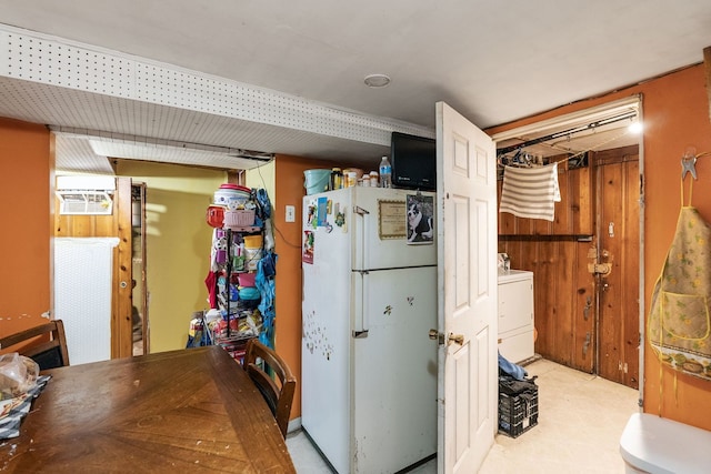 4109 W Oakdale Ave, Chicago, IL 60641 - kitchen with freestanding refrigerator and washer / clothes dryer
