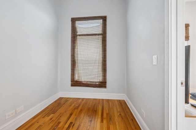 3430 S Parnell Ave, Chicago, IL 60616 - unfurnished room with wood-type flooring and baseboards